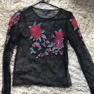 Long sleeve black mesh top with floral pattern